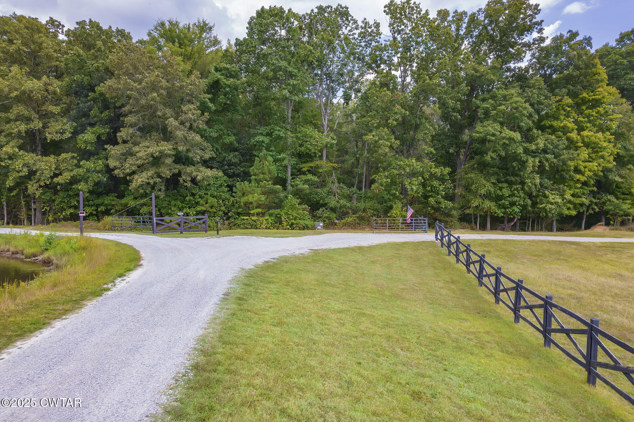 413 Law Lane Lexington, TN 38351 - Photo 21 of 25 a view of a swimming pool with a yard