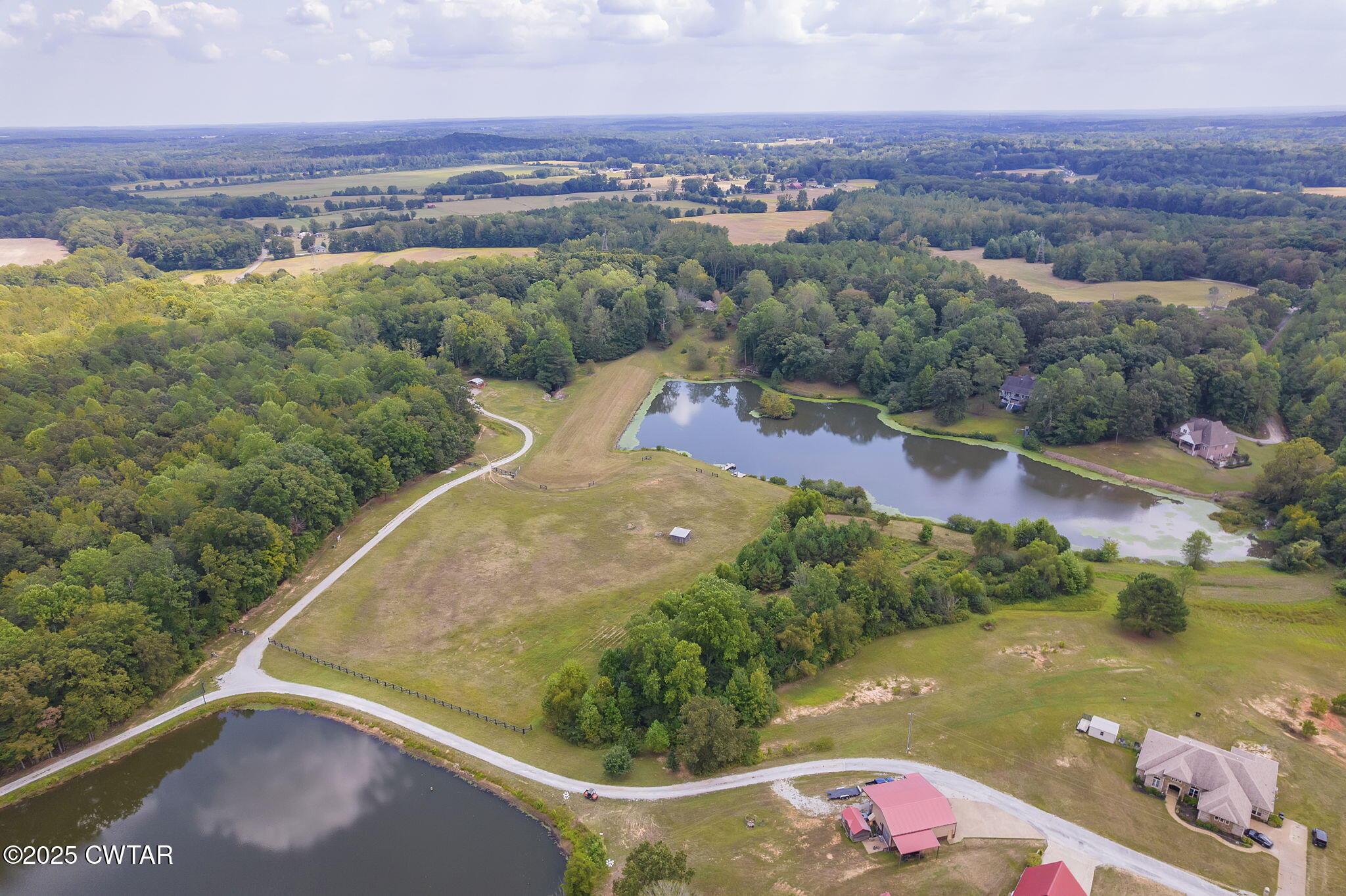 413 Law Lane Lexington, TN 38351 - Photo 24 of 25 an aerial view of residential houses with outdoor space