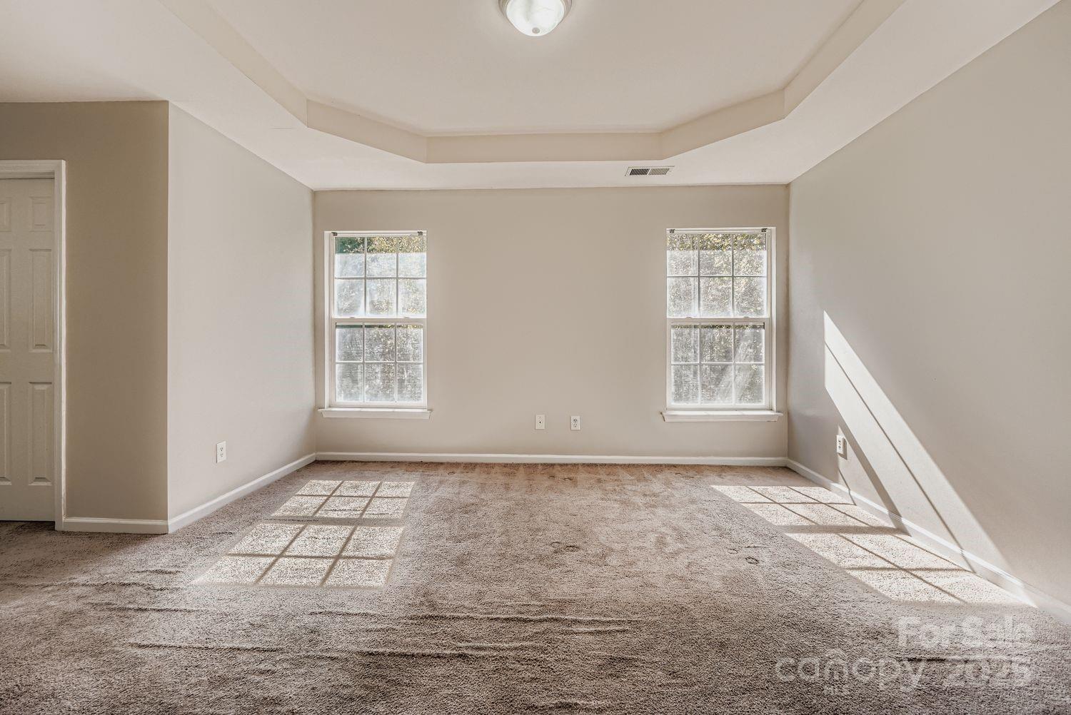11609 Erwin Ridge Avenue Charlotte, NC 28213 - Photo 12 of 29 a view of an empty room and window