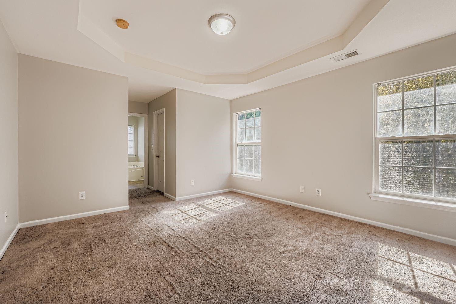 11609 Erwin Ridge Avenue Charlotte, NC 28213 - Photo 13 of 29 a view of an empty room with a window