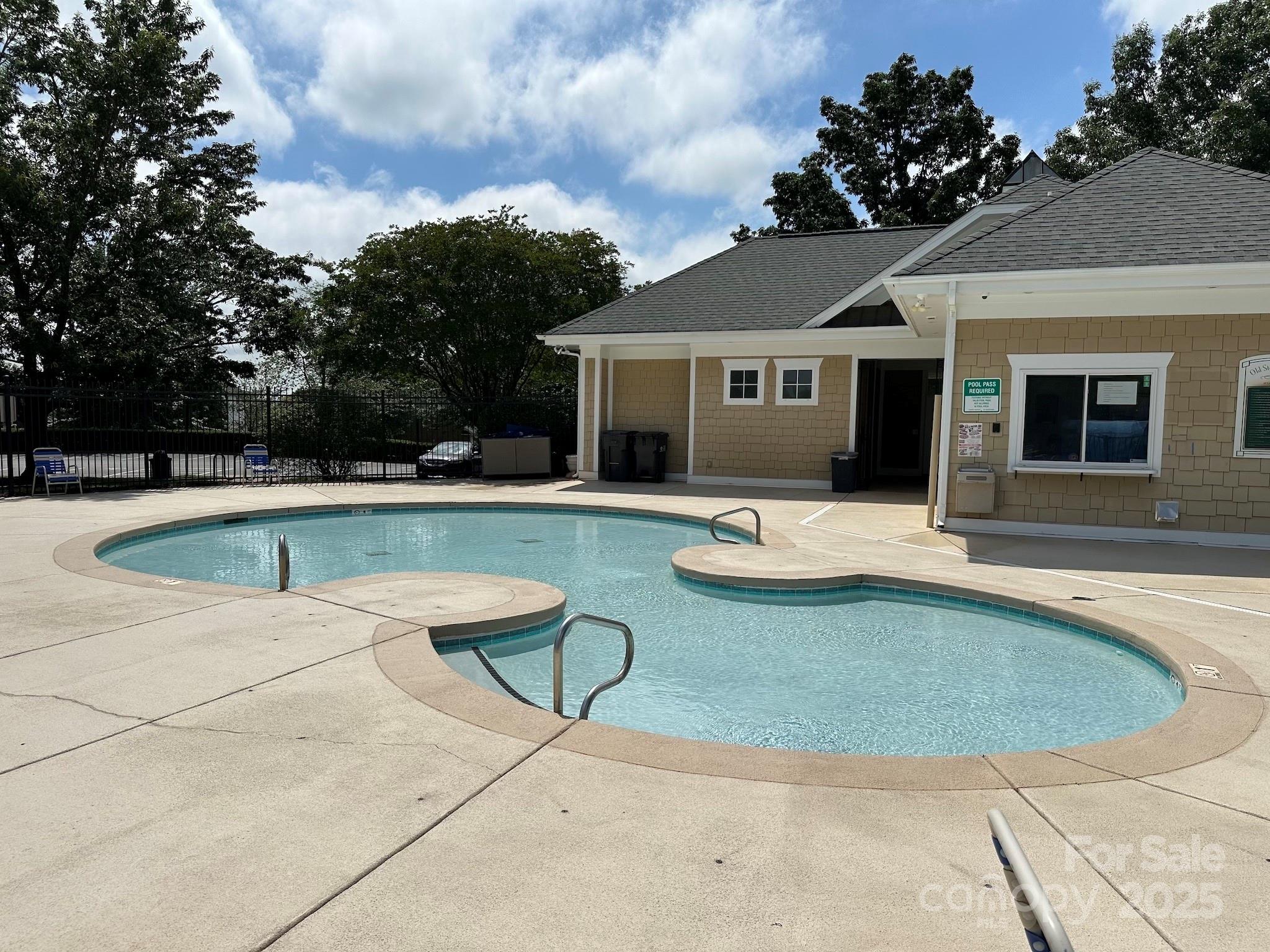 11609 Erwin Ridge Avenue Charlotte, NC 28213 - Photo 24 of 29 a view of a house with swimming pool and sitting area