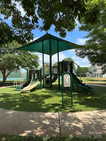 a house view with a lake view