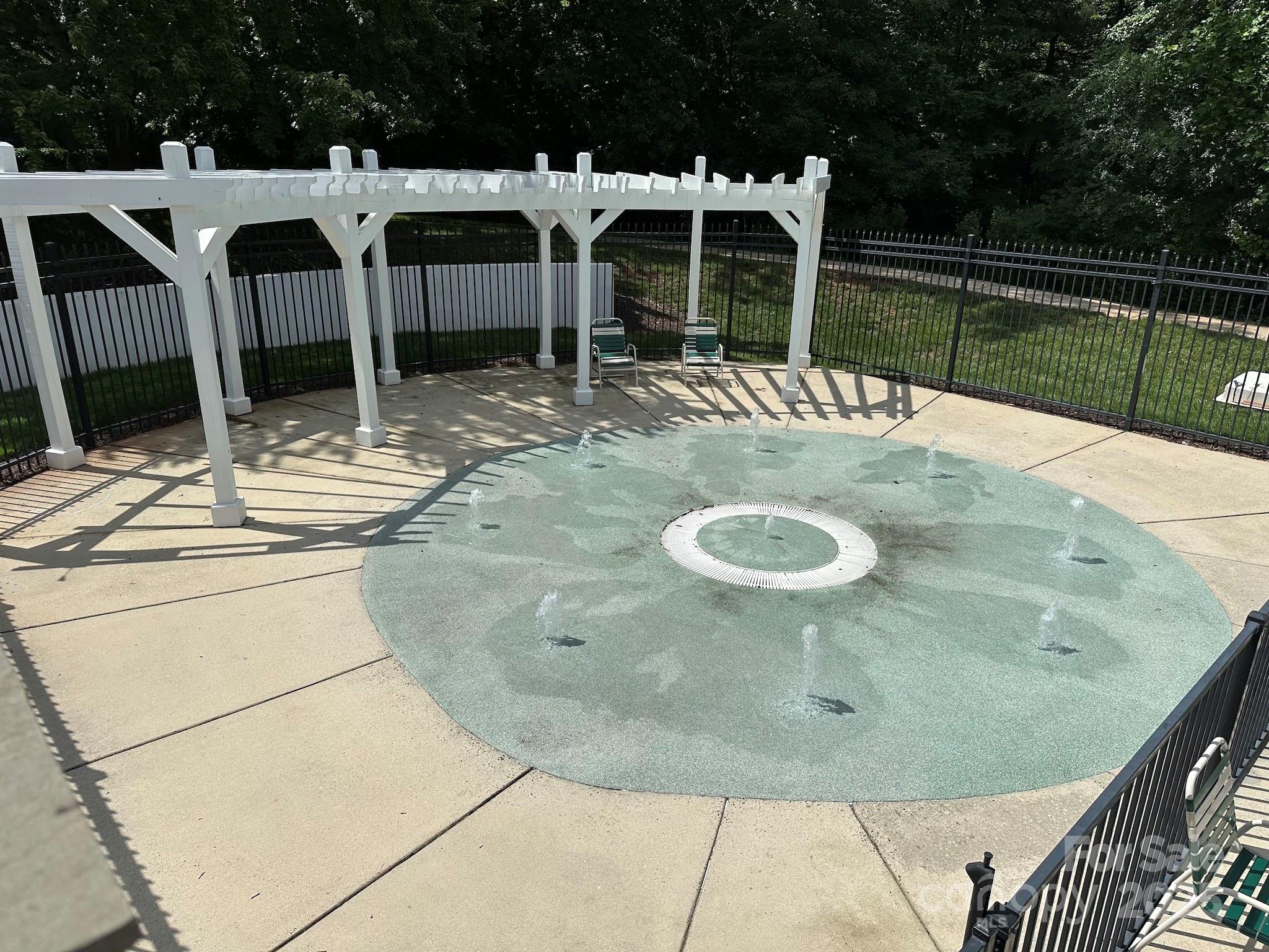 11609 Erwin Ridge Avenue Charlotte, NC 28213 - Photo 29 of 29 a view of a swimming pool with a chairs