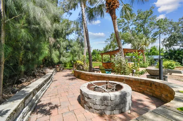 a view of a patio with swimming pool
