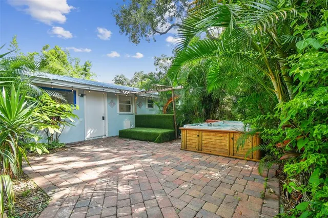 a view of a backyard with a garden