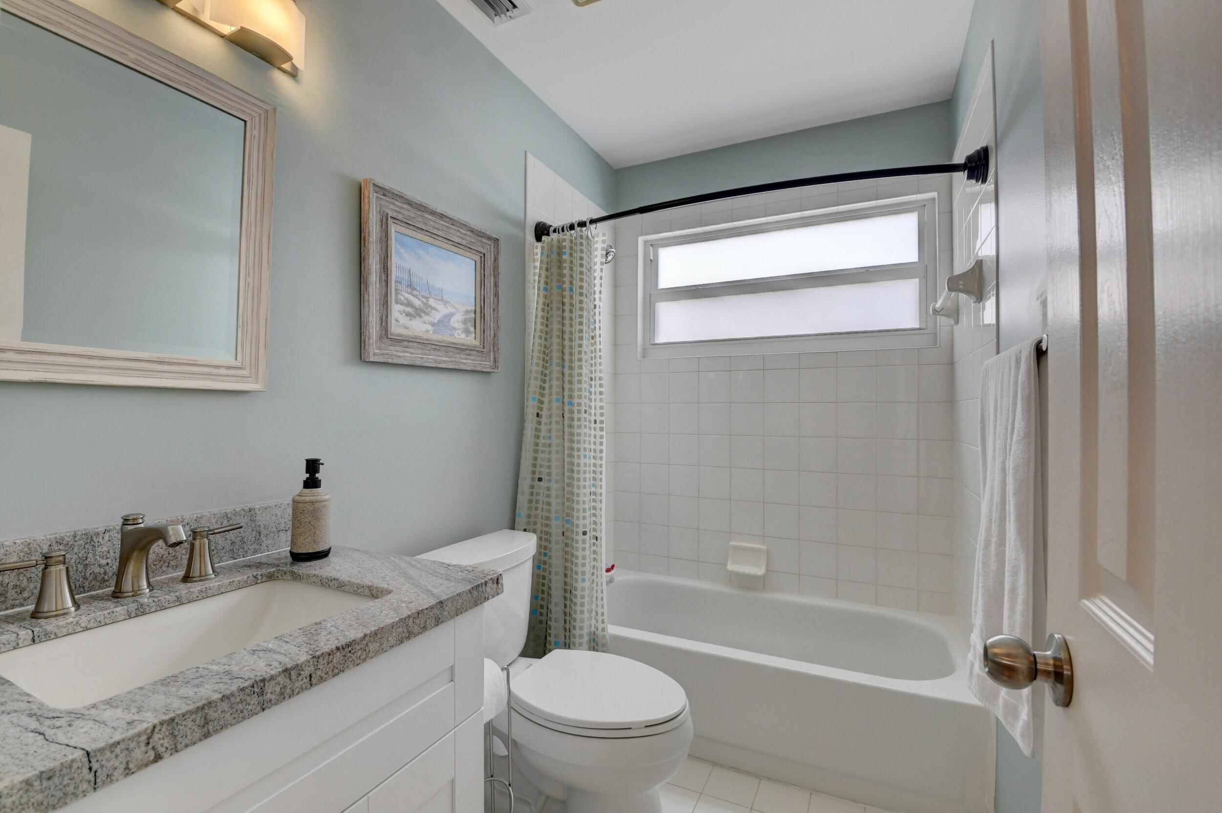 23467 Water Circle Boca Raton, FL 33486 - Photo 14 of 27 Hall Bathroom