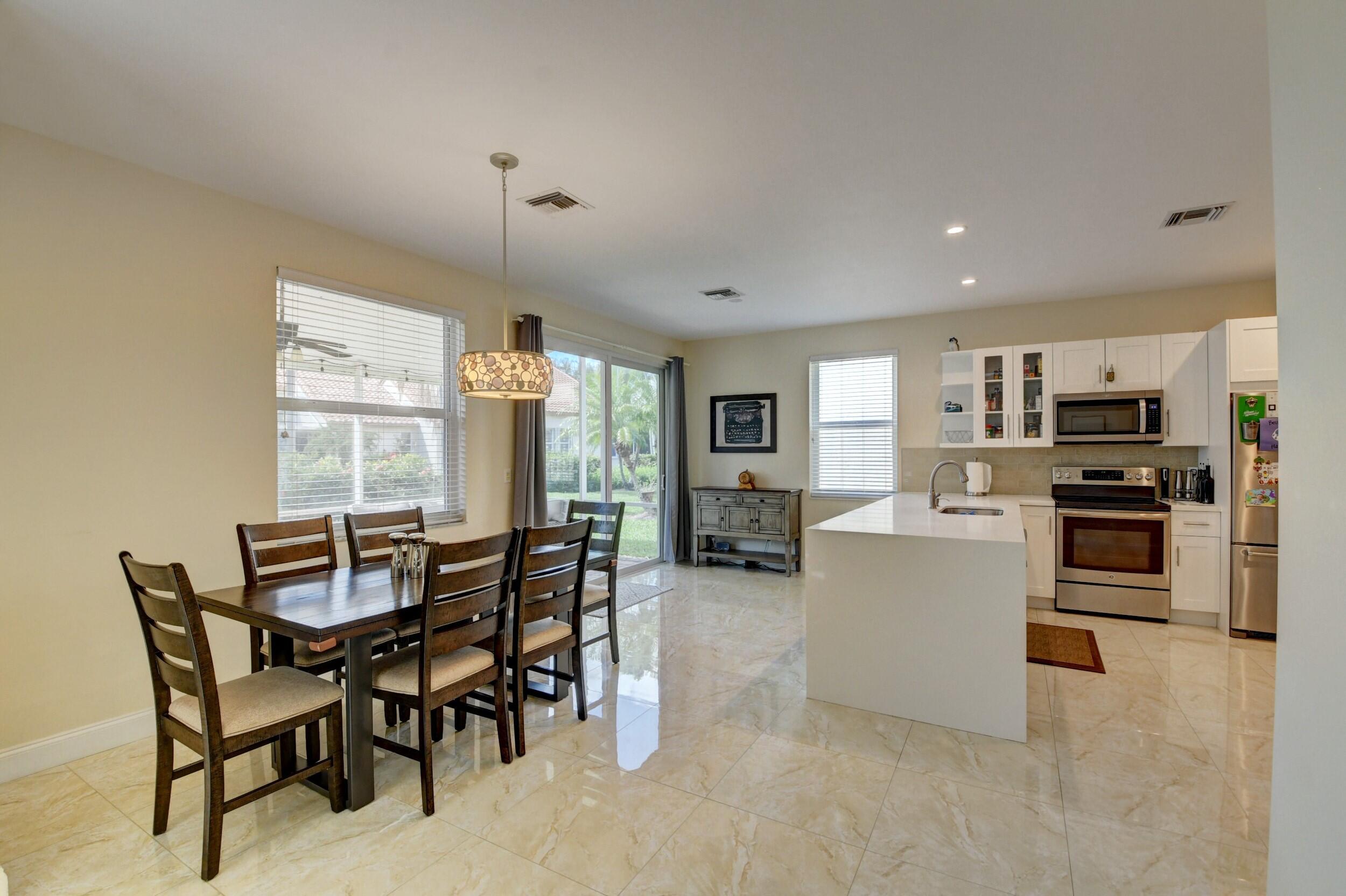 23467 Water Circle Boca Raton, FL 33486 - Photo 9 of 27 Dining into Kitchen