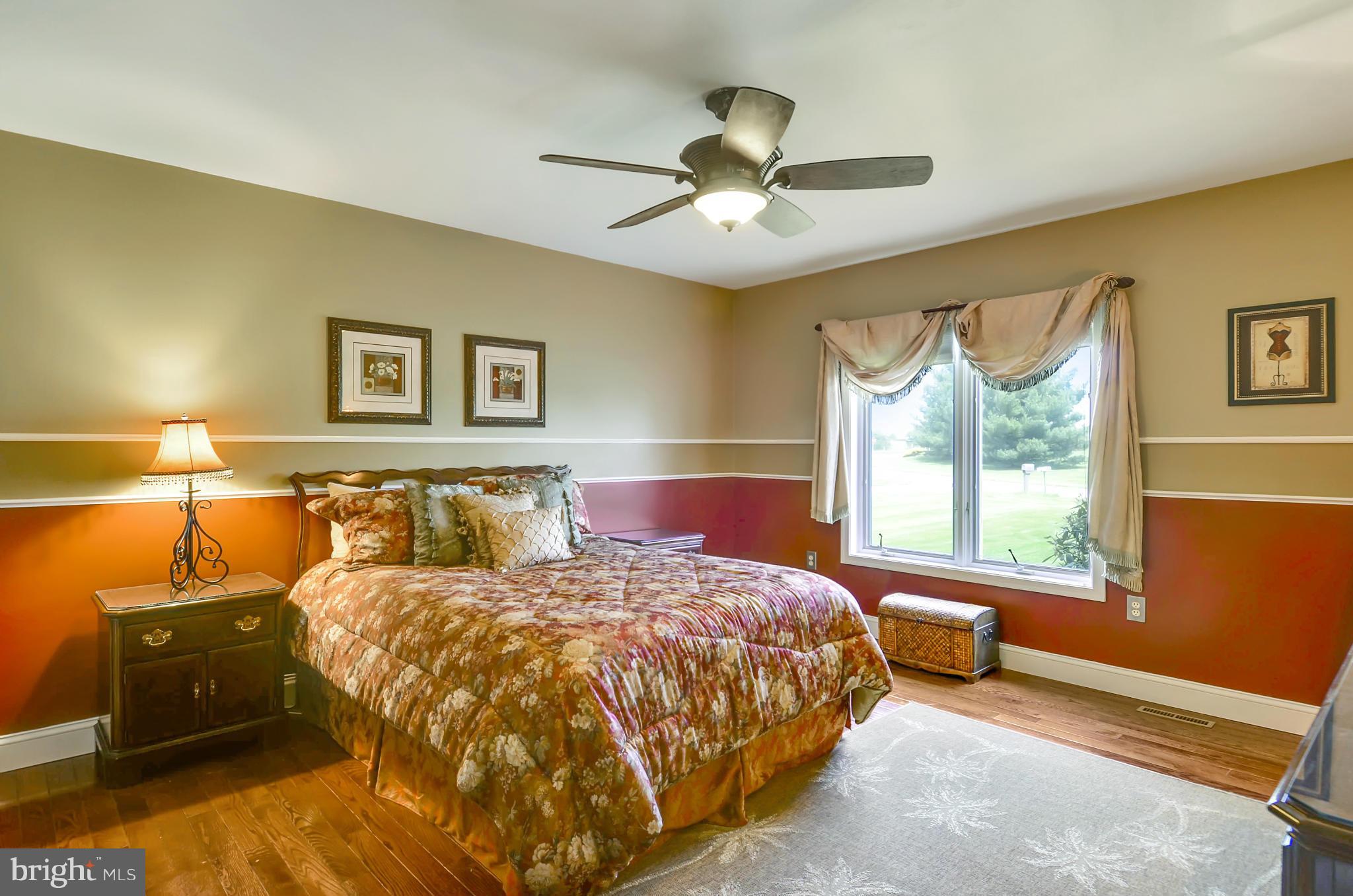 5006 South Renn Court Frederick, MD 21703 - Photo 14 of 30 a bed room with a bed and a window