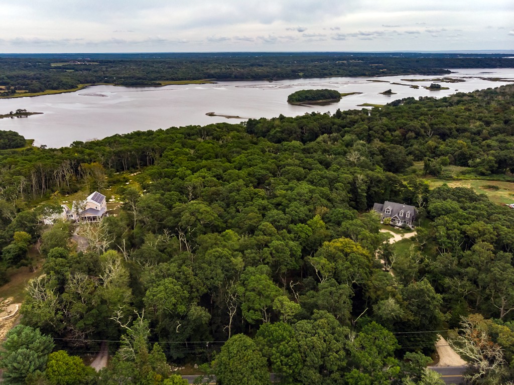 234 Old Harbor Road Westport, MA 02790 - Photo 3 of 16 a view of a lake from a yard