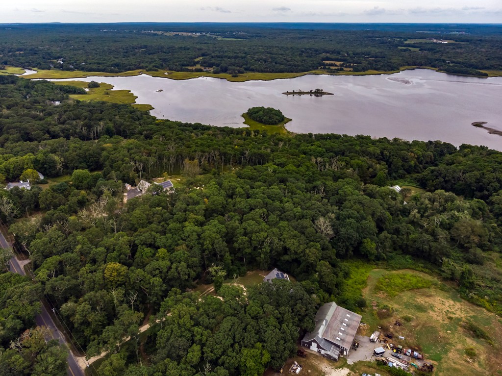 234 Old Harbor Road Westport, MA 02790 - Photo 6 of 16 an aerial view of houses with outdoor space