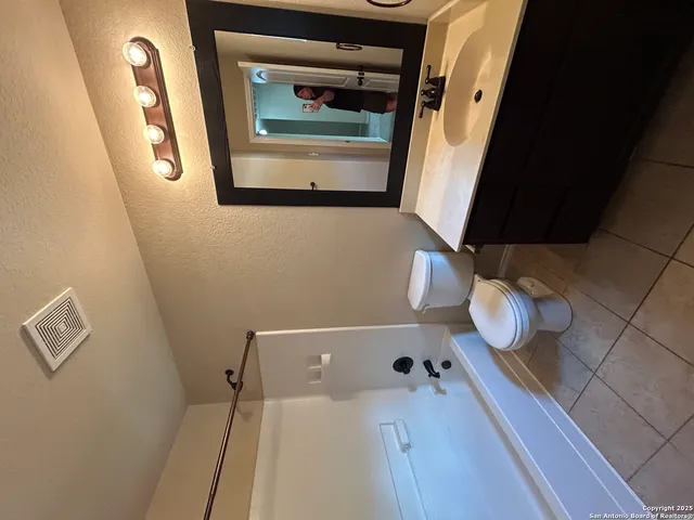 a bathroom with a bathtub
