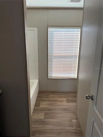 a view of a bathroom with a window