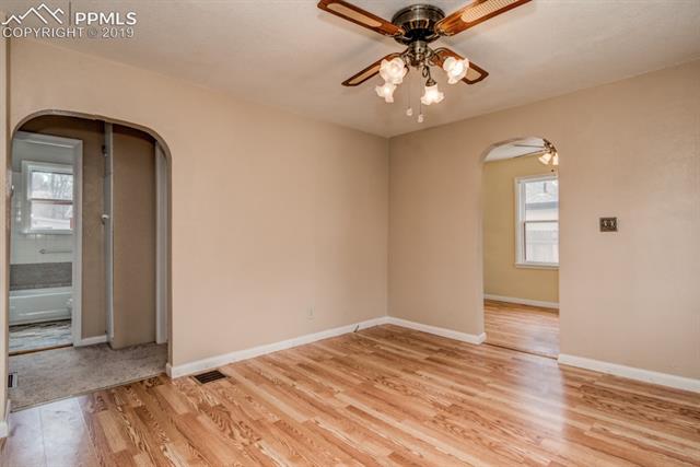 611 Prairie Road Colorado Springs, CO 80909 - Photo 7 of 18 Beautiful archways bring a softness to the home along with additional character.