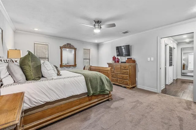 a bathroom with a shower a toilet and a sink