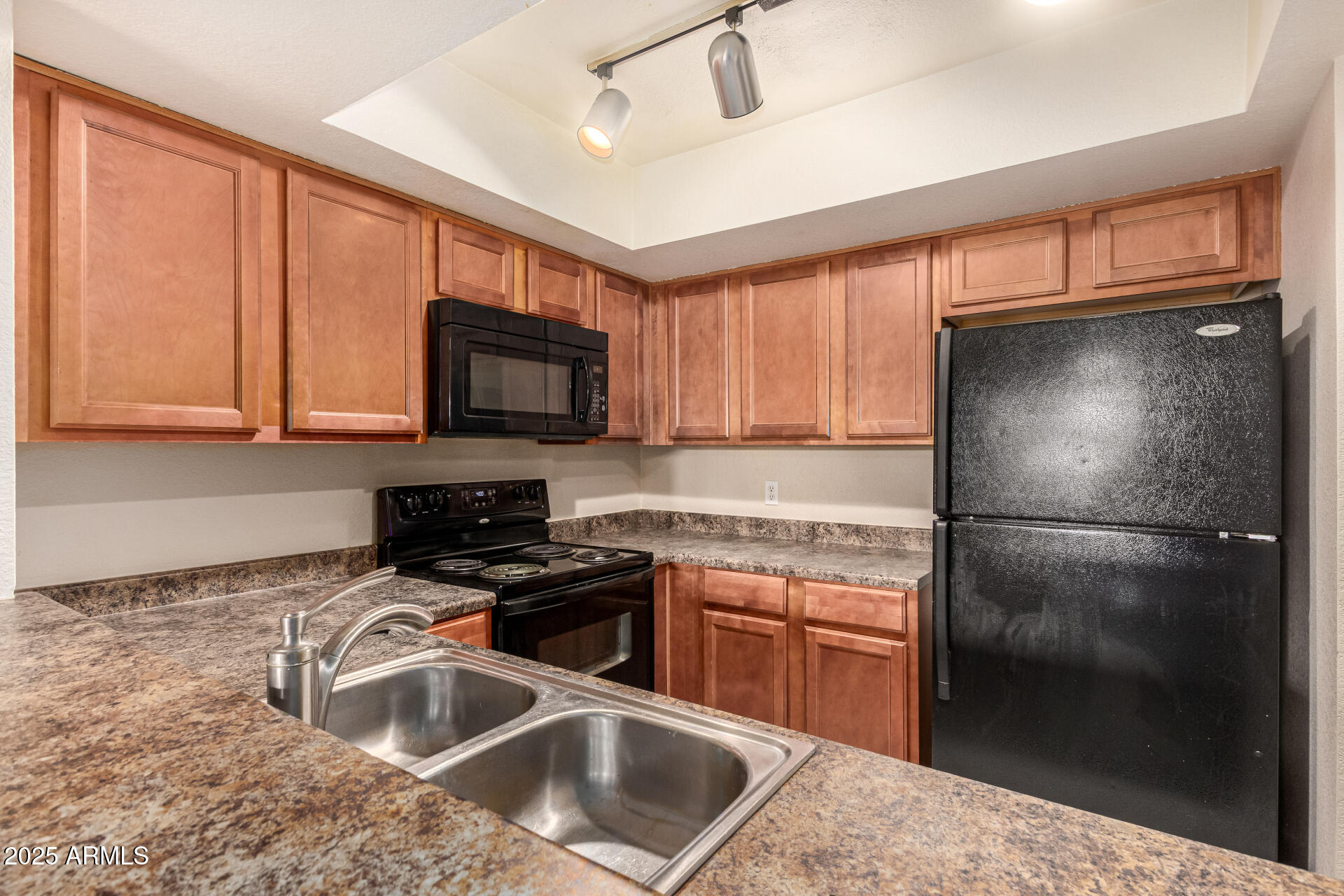 1331 West Baseline Road, Unit 167 Mesa, AZ 85202 - Photo 13 of 42 a kitchen with a refrigerator stove and microwave