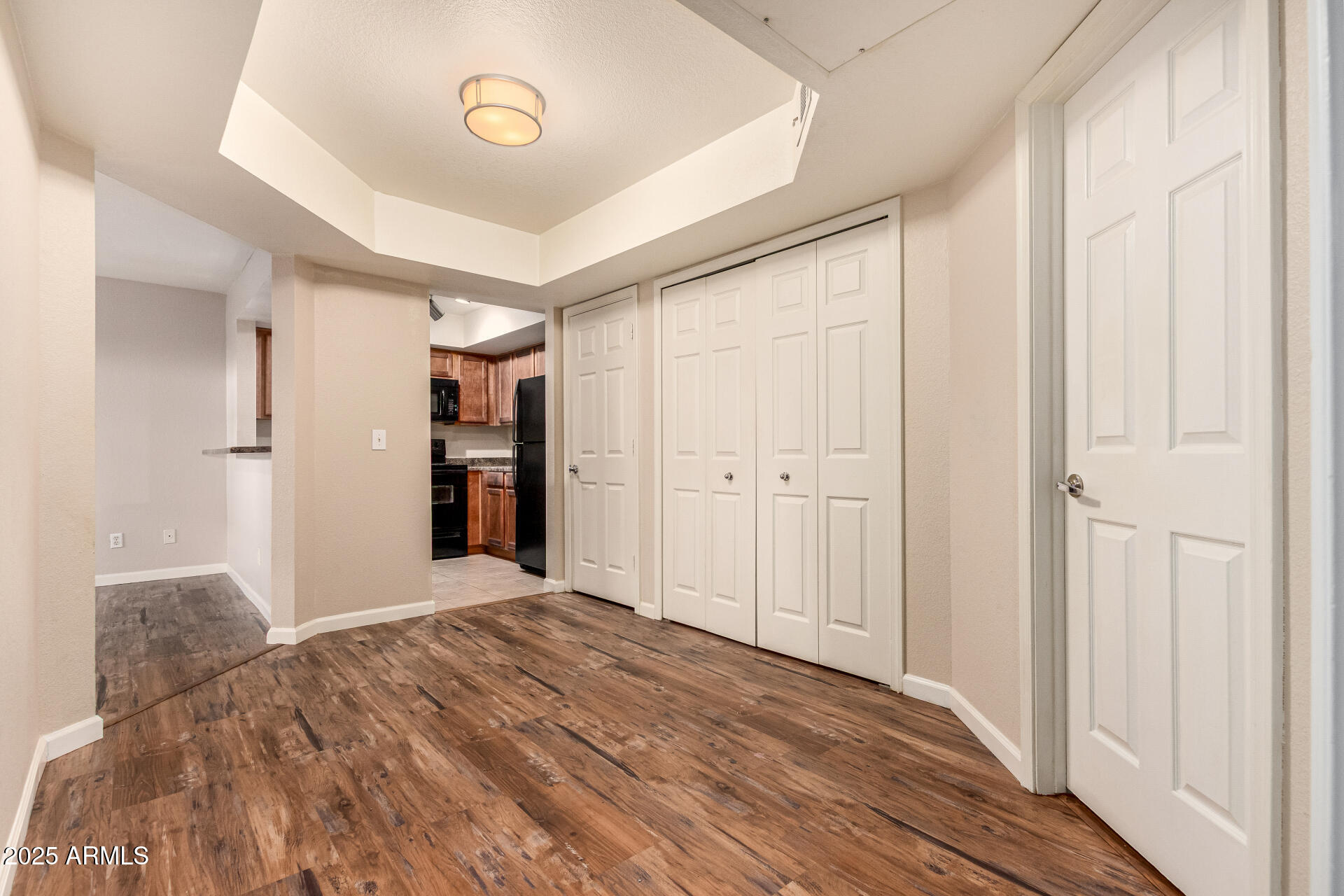 1331 West Baseline Road, Unit 167 Mesa, AZ 85202 - Photo 14 of 42 a view of a livingroom with wooden floor