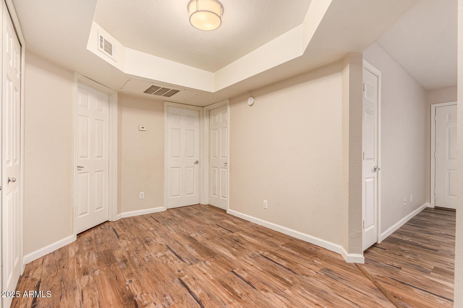 1331 West Baseline Road, Unit 167 Mesa, AZ 85202 - Photo 16 of 42 a view of a room with wooden floor
