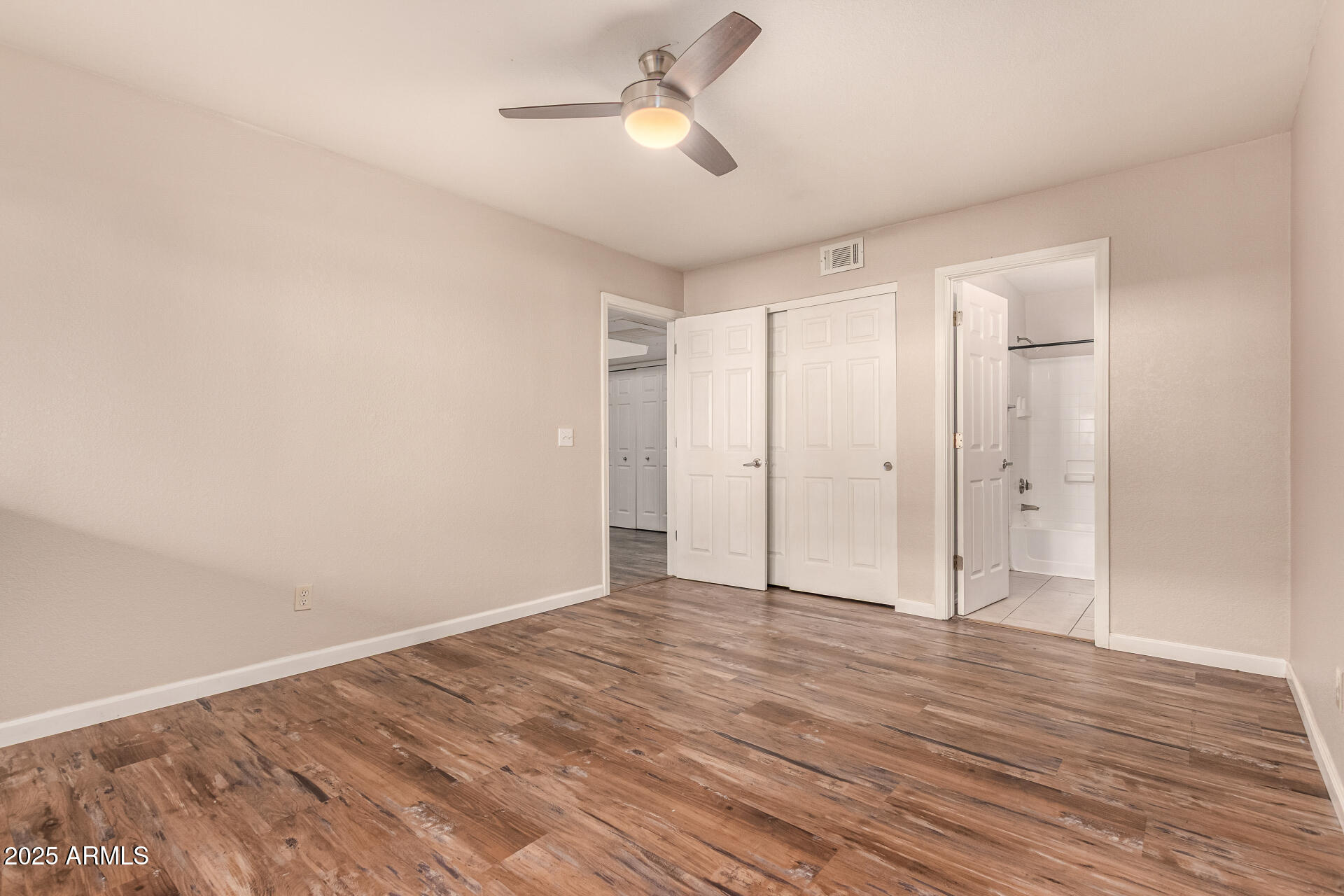 1331 West Baseline Road, Unit 167 Mesa, AZ 85202 - Photo 19 of 42 a view of empty room with wooden floor
