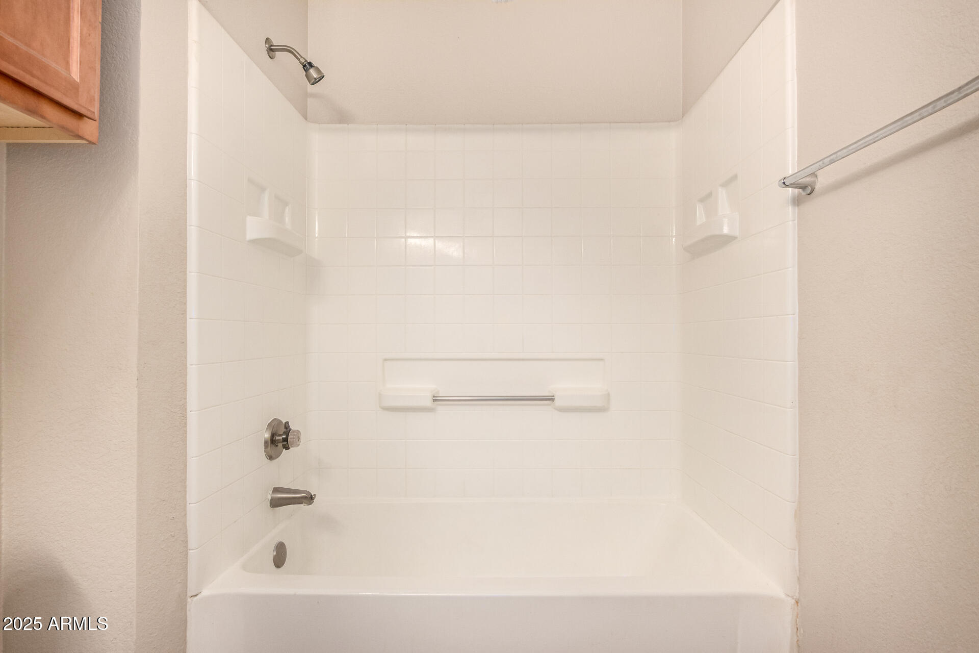 1331 West Baseline Road, Unit 167 Mesa, AZ 85202 - Photo 26 of 42 a bathroom with a bathtub