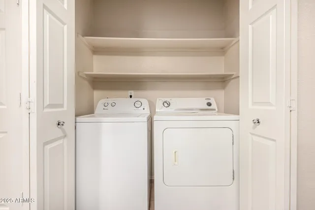 a utility room with dryer and washer