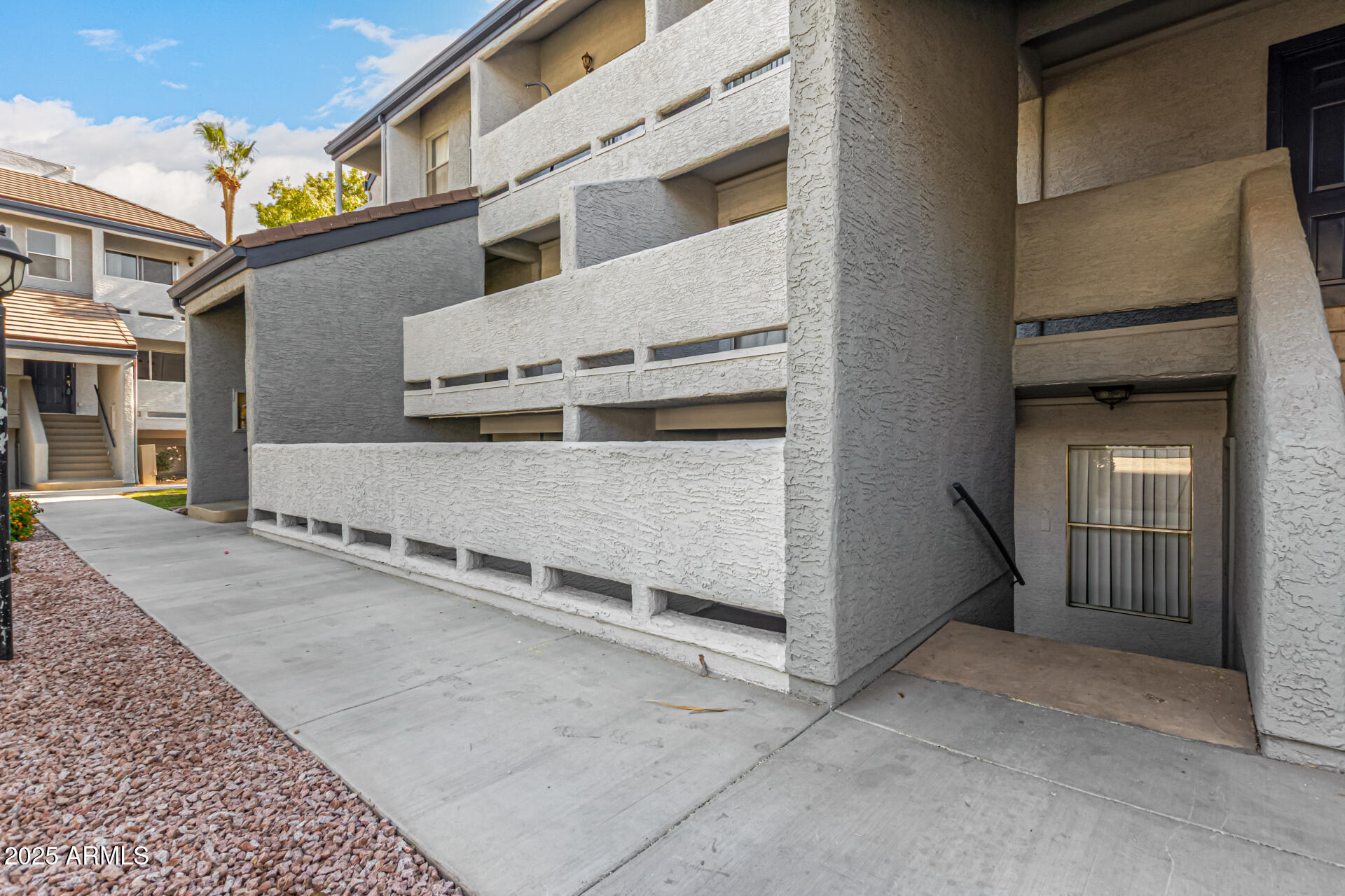 1331 West Baseline Road, Unit 167 Mesa, AZ 85202 - Photo 3 of 42 a view of a house with a outdoor space