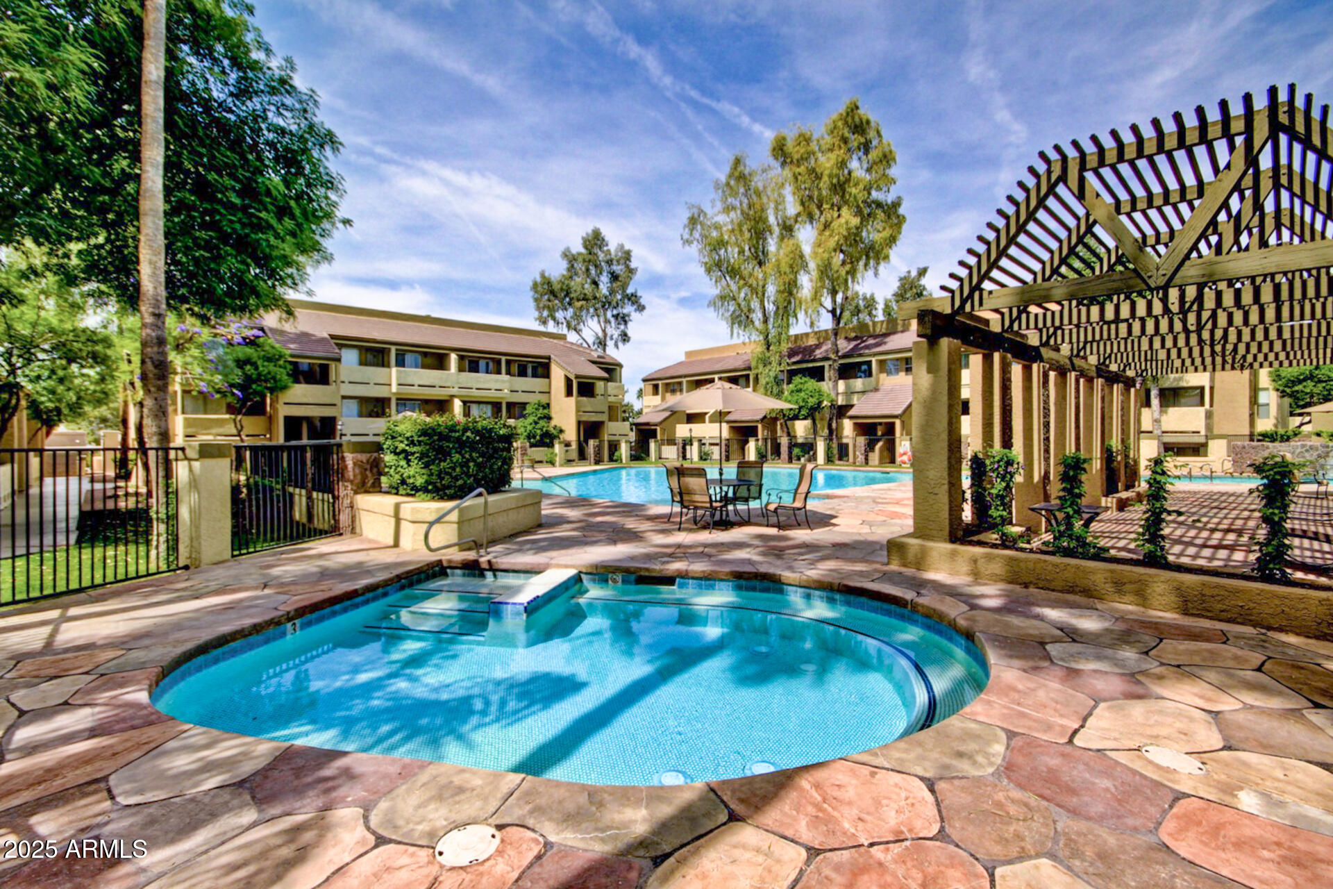 1331 West Baseline Road, Unit 167 Mesa, AZ 85202 - Photo 38 of 42 a swimming pool with outdoor seating yard and barbeque oven