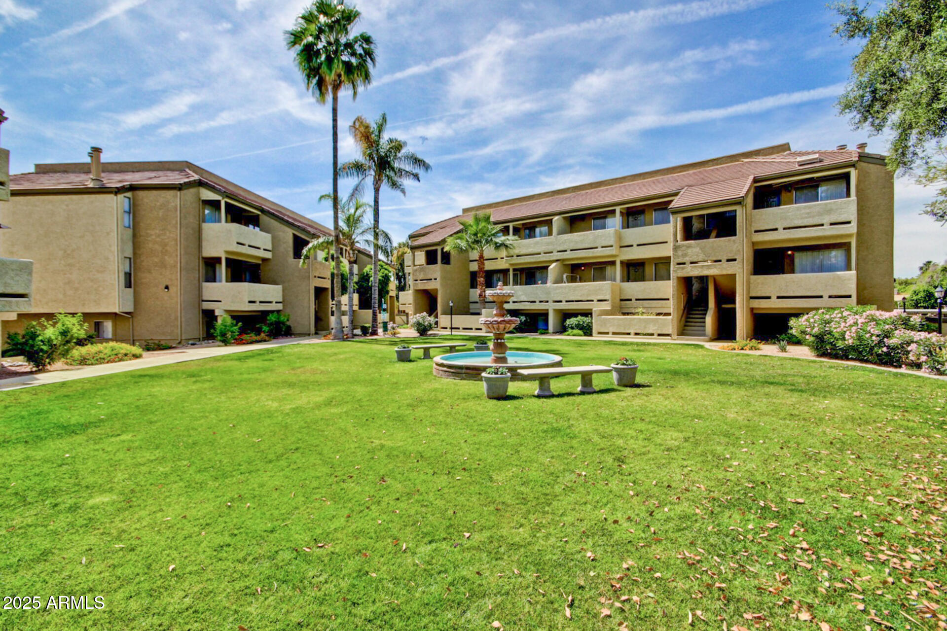 1331 West Baseline Road, Unit 167 Mesa, AZ 85202 - Photo 39 of 42 a view of a house with backyard sitting area and garden