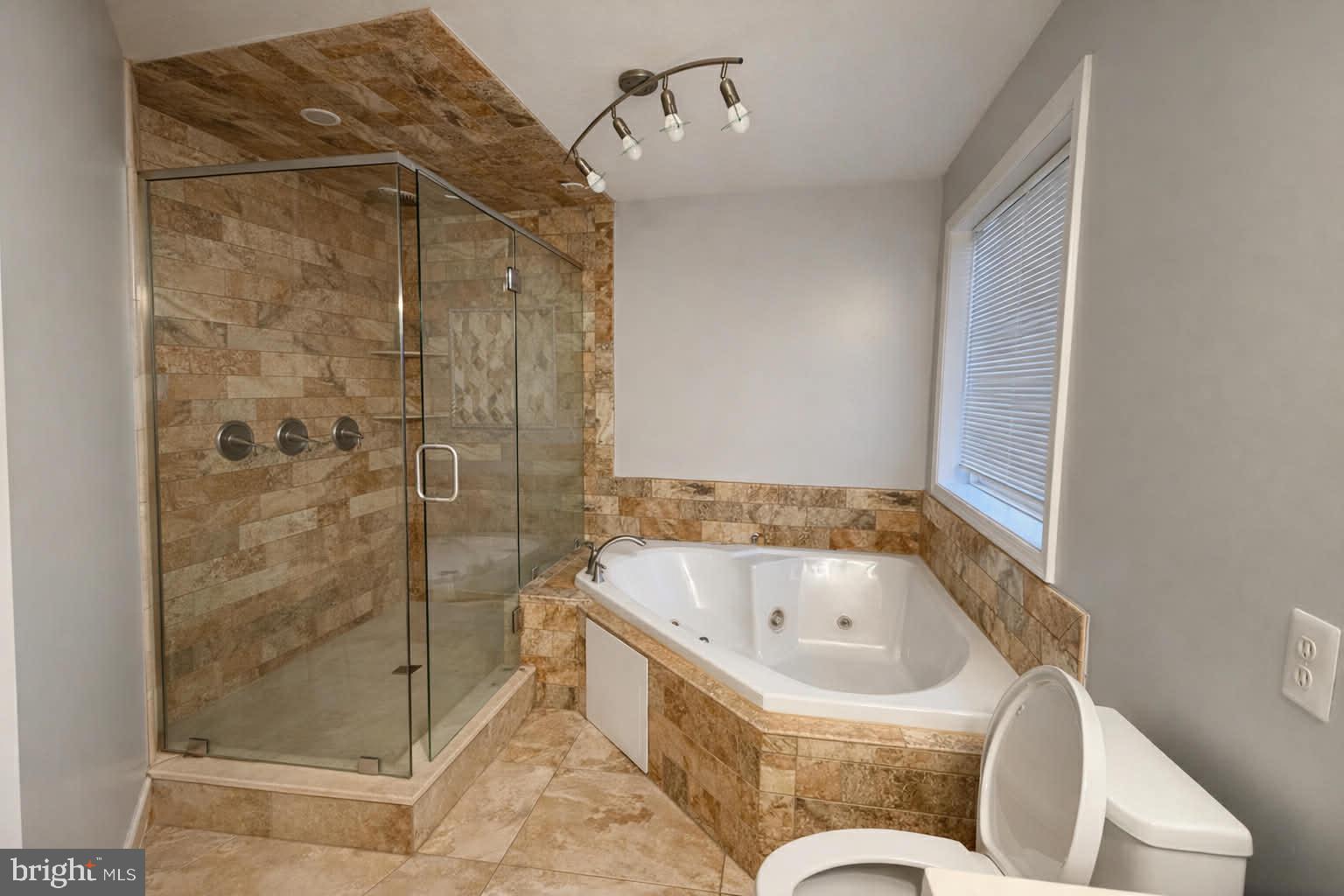 209 Estate Drive Ruther Glen, VA 22546 - Photo 20 of 67 a bathroom with a bathtub and shower