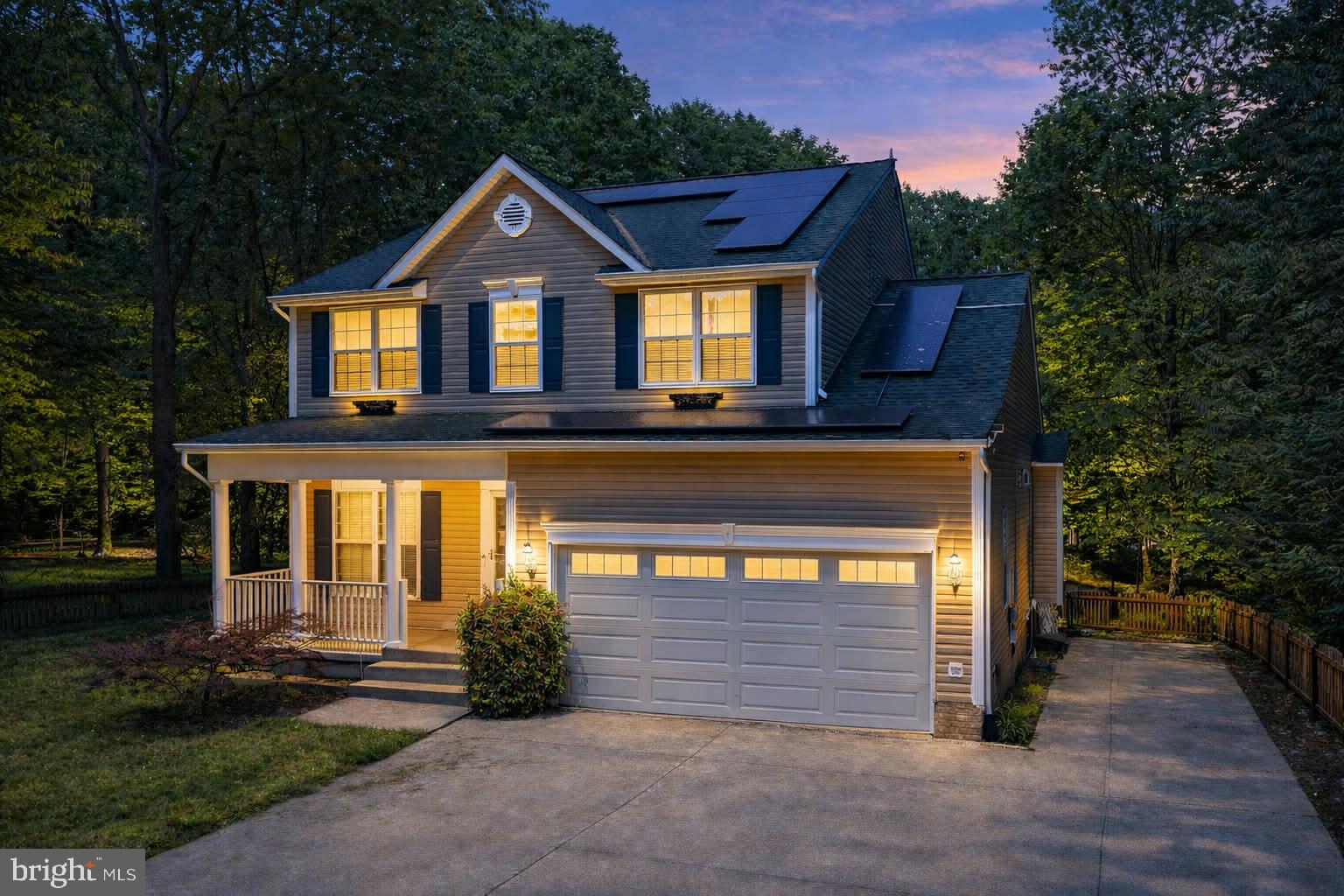 209 Estate Drive Ruther Glen, VA 22546 - Photo 2 of 67 a front view of a house with a yard