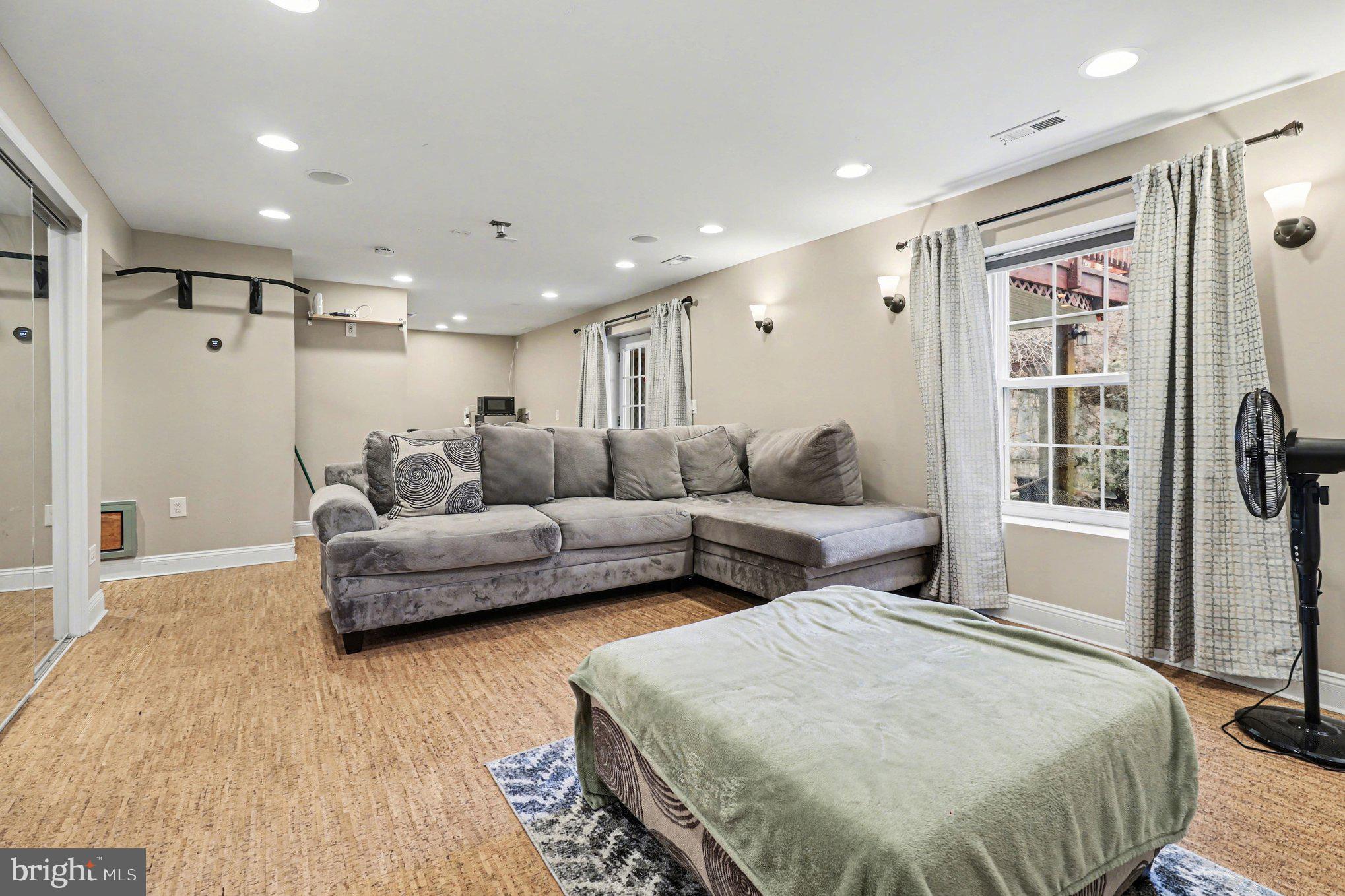 209 Estate Drive Ruther Glen, VA 22546 - Photo 27 of 67 a spacious bedroom with a bed and a window