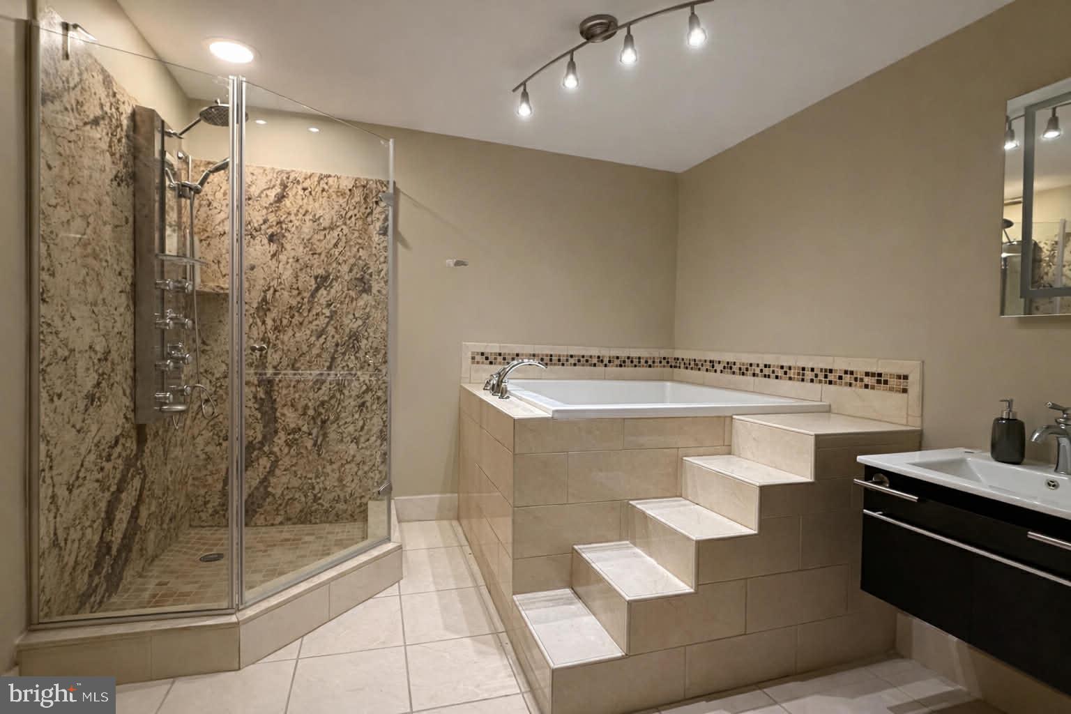 209 Estate Drive Ruther Glen, VA 22546 - Photo 30 of 67 a spacious bathroom with a shower and mirror
