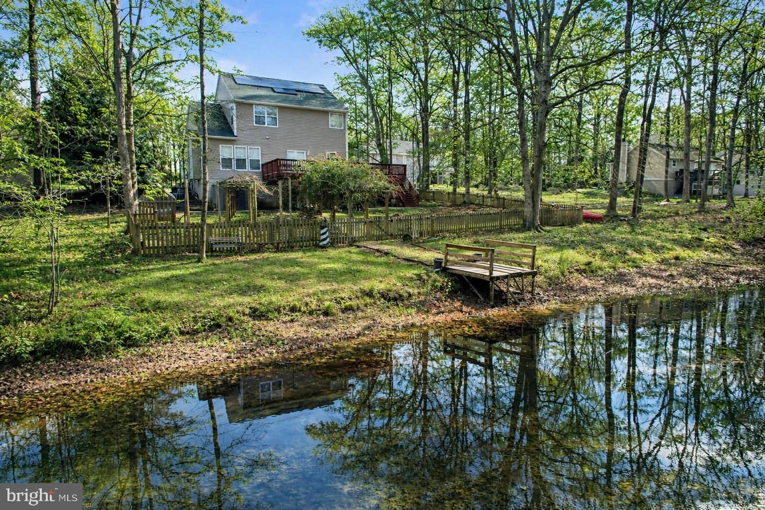 209 Estate Drive Ruther Glen, VA 22546 - Photo 40 of 67 Serene lakeside retreat in nature.