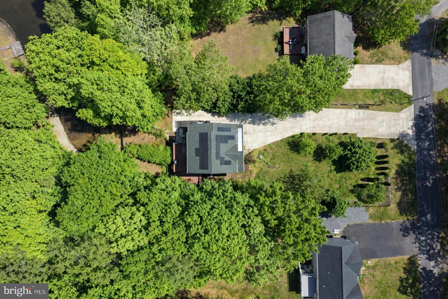 209 Estate Drive Ruther Glen, VA 22546 - Photo 41 of 67 an aerial view of a house with a yard and lake view