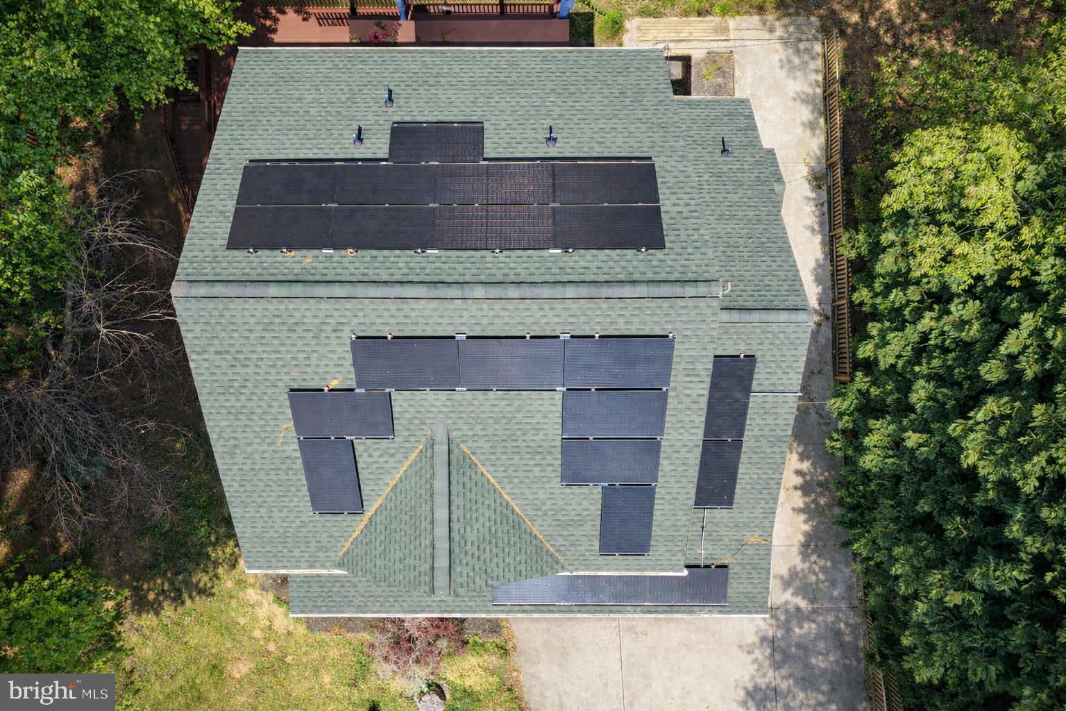 209 Estate Drive Ruther Glen, VA 22546 - Photo 43 of 67 Solar panels atop a modern home.