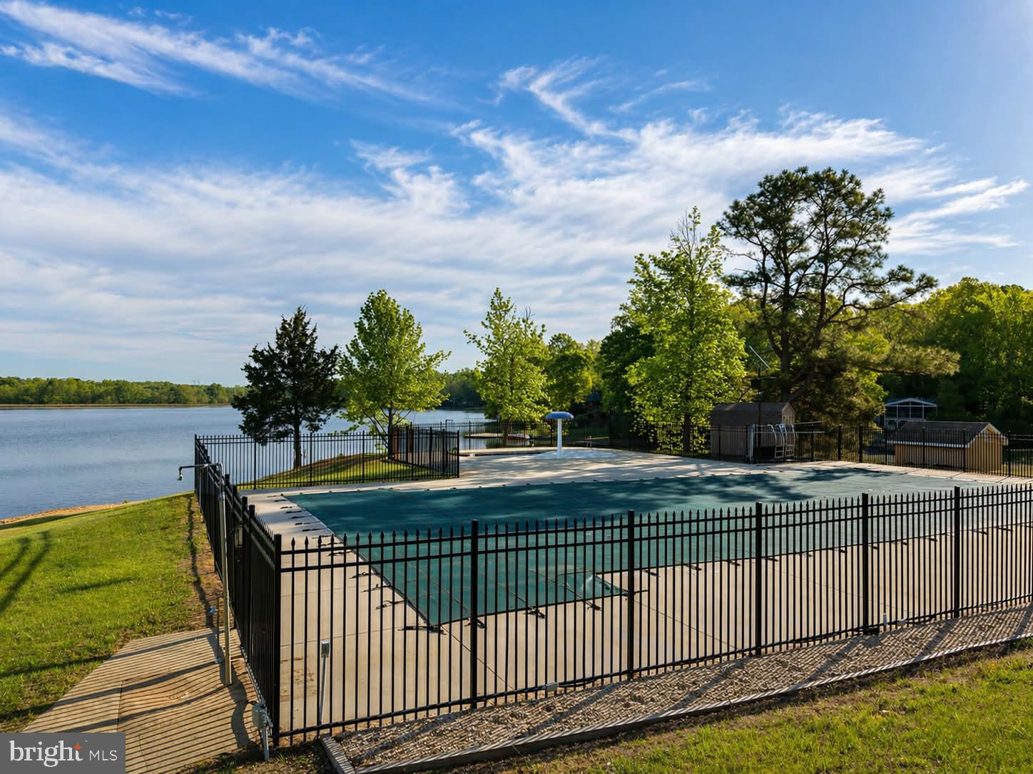 209 Estate Drive Ruther Glen, VA 22546 - Photo 51 of 67 Tranquil lakeside pool retreat.