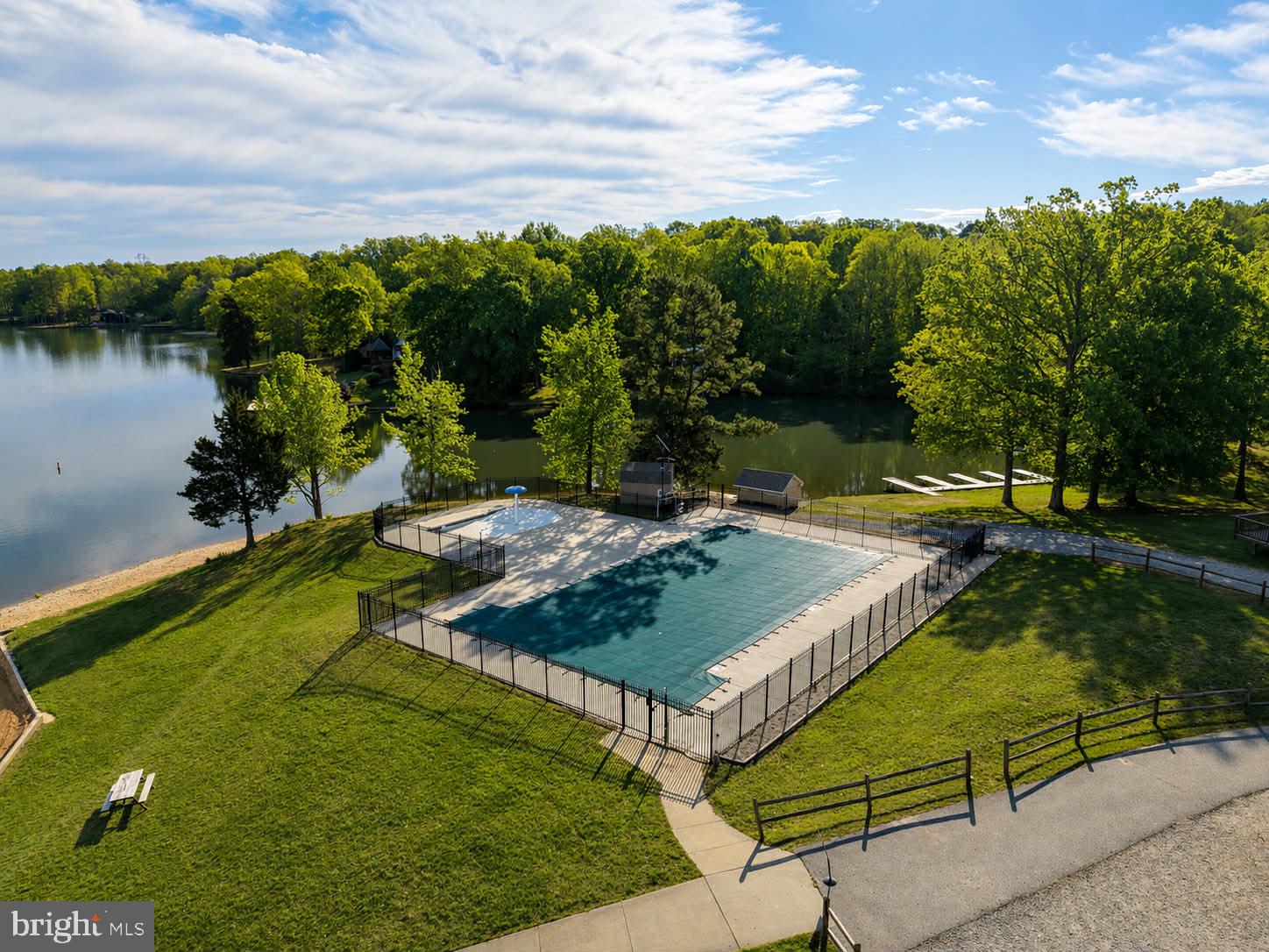209 Estate Drive Ruther Glen, VA 22546 - Photo 52 of 67 a view of a backyard with sitting area
