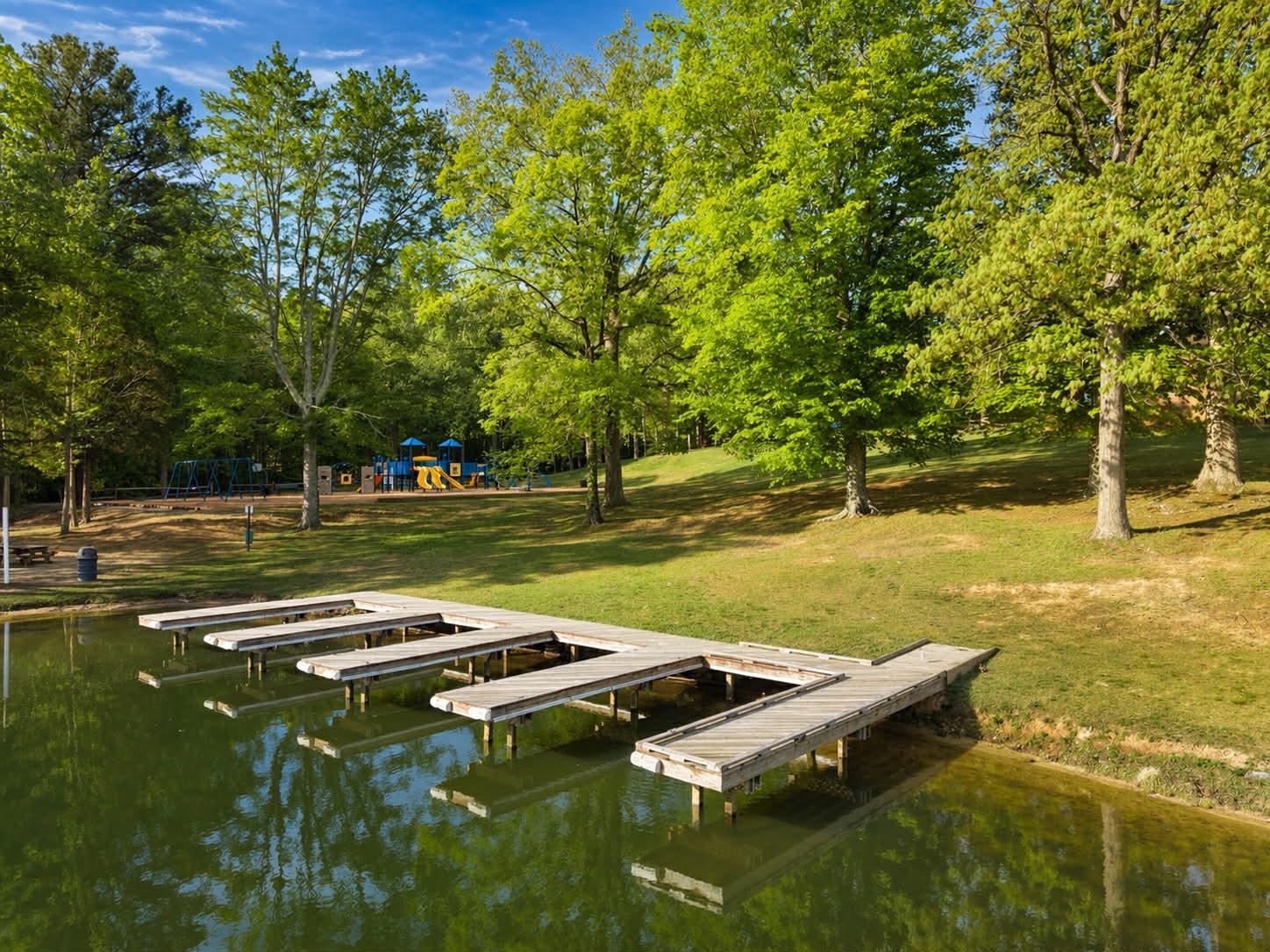 209 Estate Drive Ruther Glen, VA 22546 - Photo 53 of 67 a view of a golf course with a lake