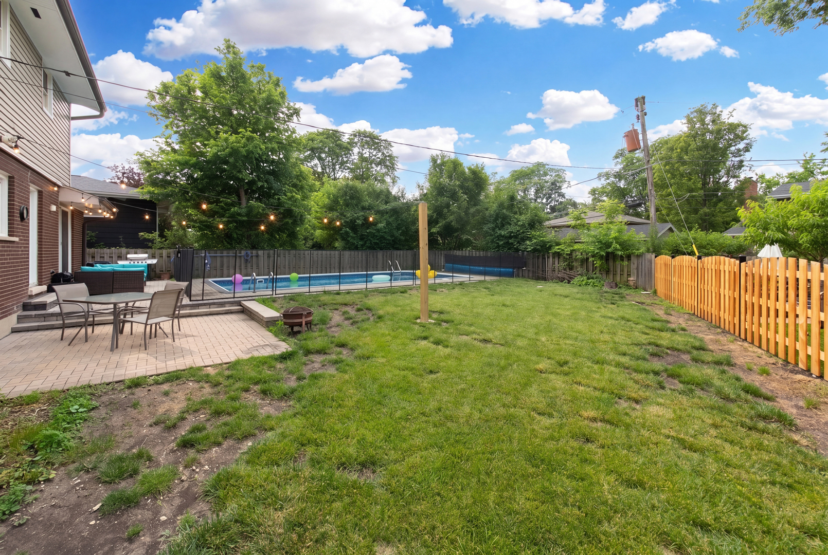 2005 Cayuga Lane Mount Prospect, IL 60056 - Photo 24 of 28 a swimming pool with outdoor seating and yard