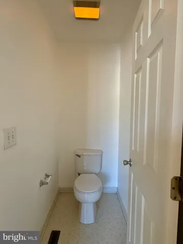 a bathroom with a sink toilet tub and shower