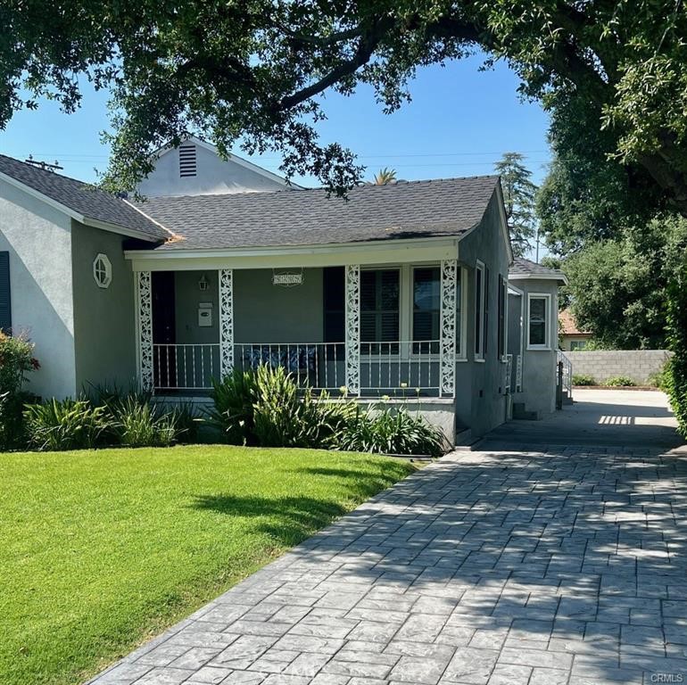 8309 East Bevan Street San Gabriel, CA 91775 - Photo 5 of 14 a front view of a house with a yard