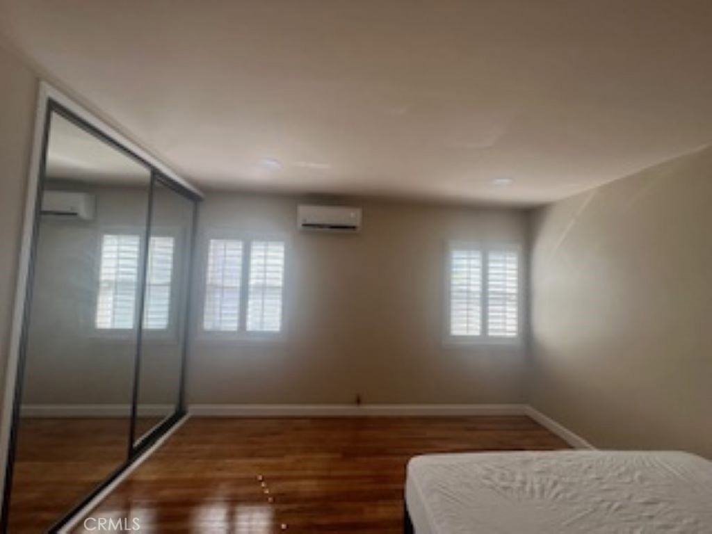 8309 East Bevan Street San Gabriel, CA 91775 - Photo 9 of 14 an empty room with windows and closet