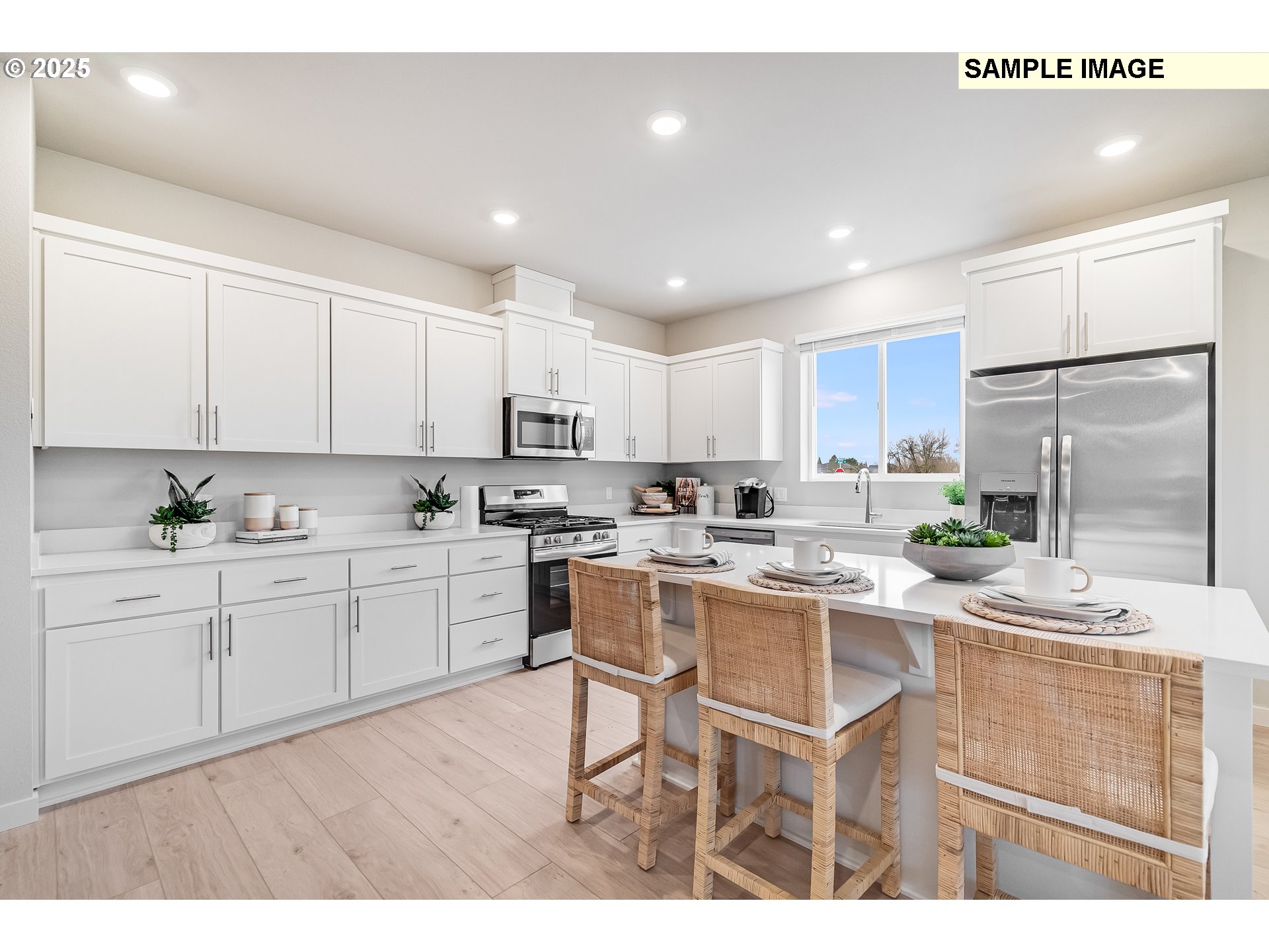 4327 Hackamore Court Southeast Albany, OR 97322 - Photo 3 of 25 a kitchen with appliances a sink and cabinets