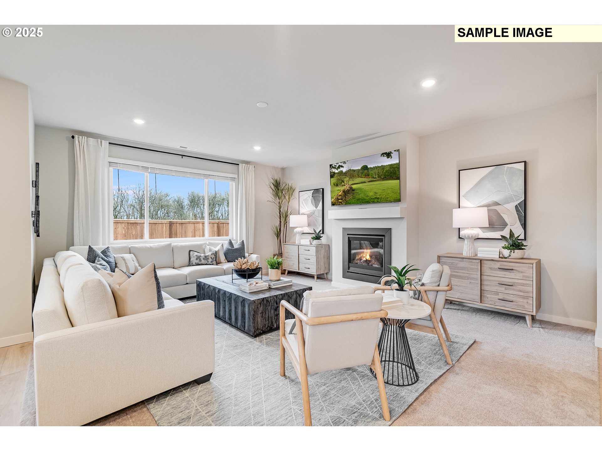 4327 Hackamore Court Southeast Albany, OR 97322 - Photo 10 of 25 a living room with furniture a fireplace a rug and a large window