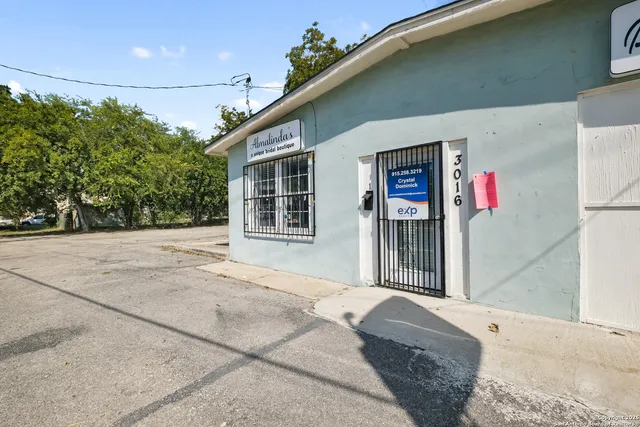 a front view of a house with a garage
