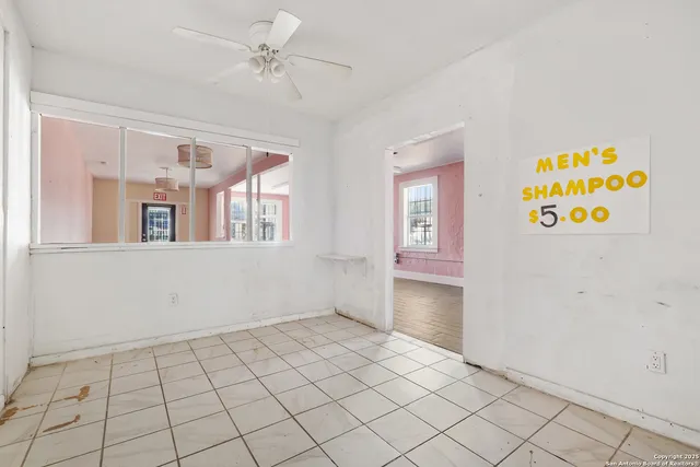 a view of an empty room and window