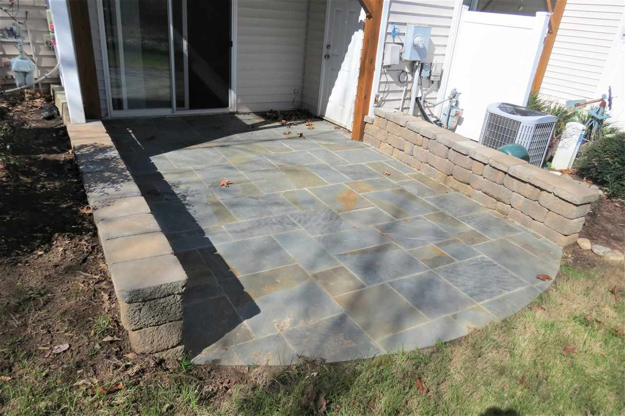 8004 Beech Tree Ridge Trail Raleigh, NC 27612 - Photo 30 of 30 Custom extended patio, approved by HOA, was installed in fall of 2018. Patio/Deck