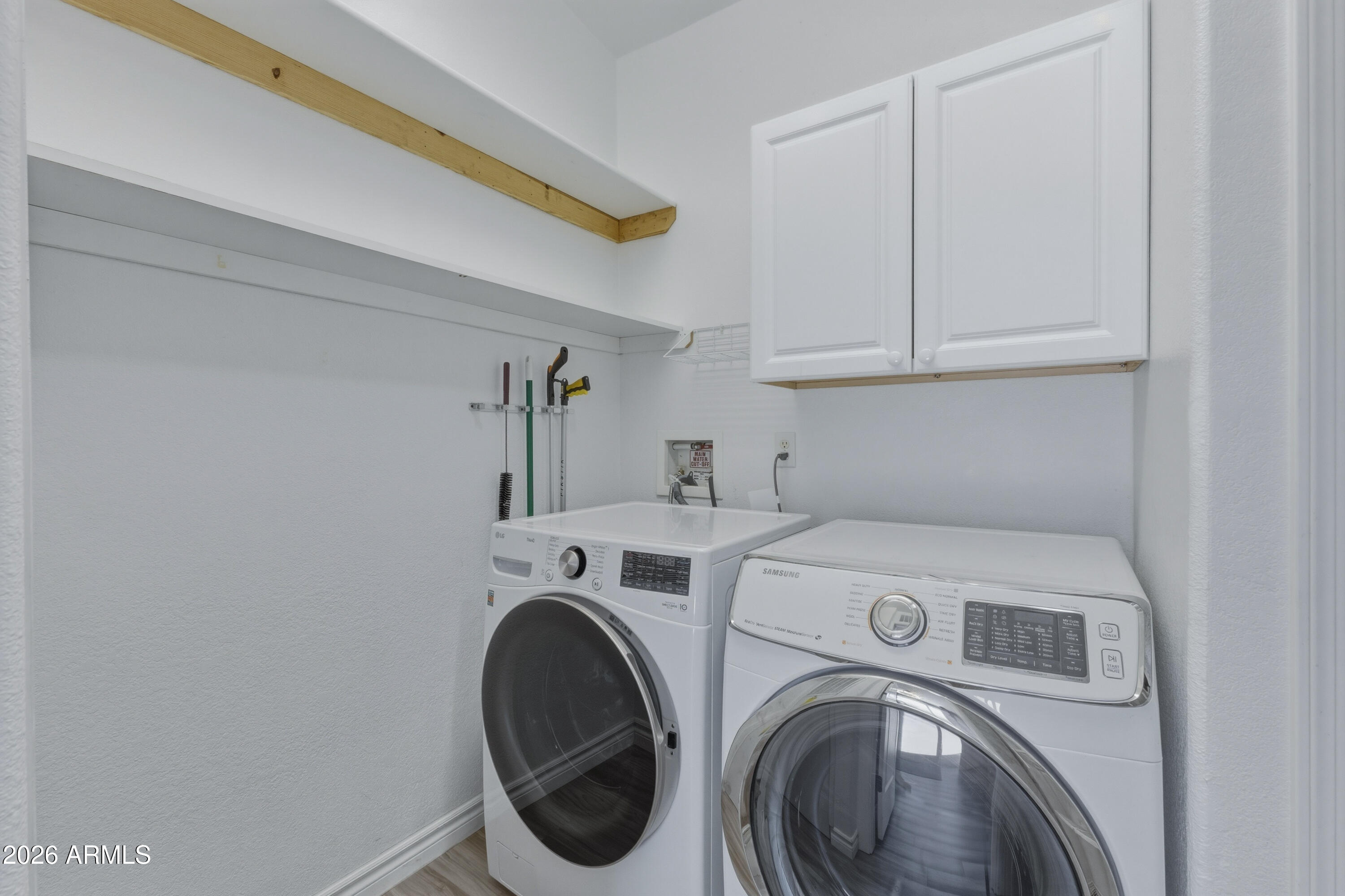 2000 South Apache Road, Unit 371 Buckeye, AZ 85326 - Photo 31 of 38 a utility room with dryer and washer