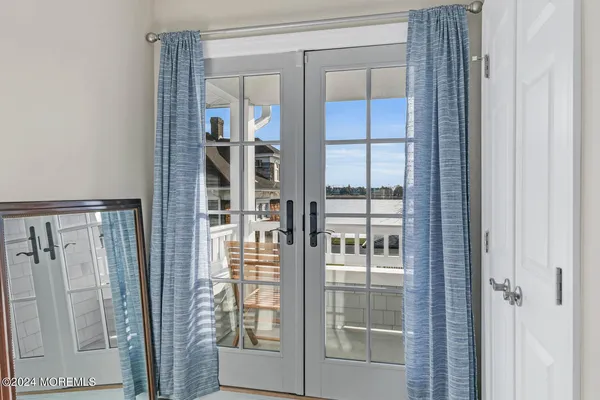a view of a bathroom with a glass door