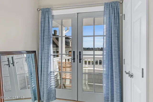 a view of a bathroom with a glass door