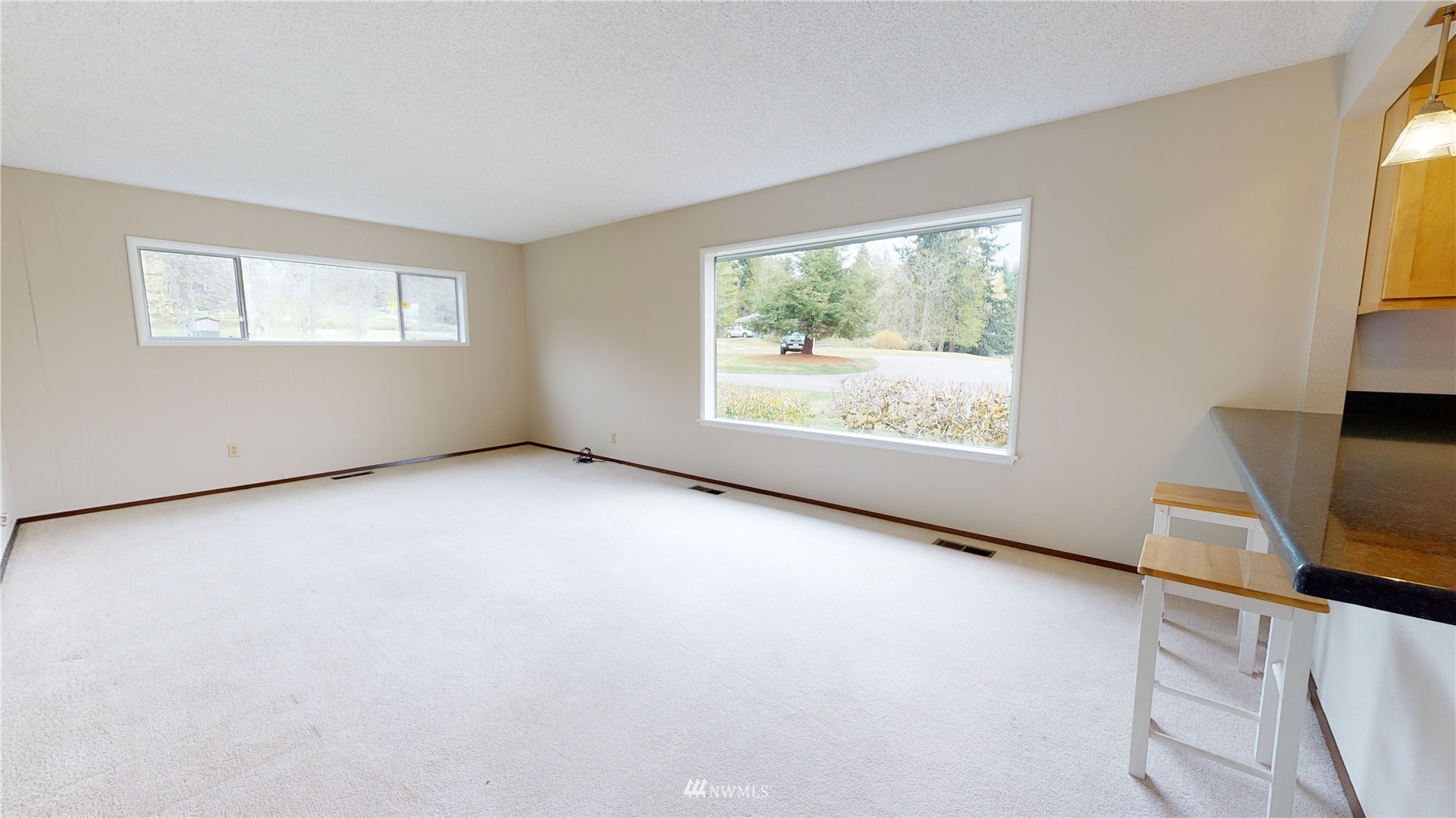 2530 Mountain View Road East Port Orchard, WA 98366 - Photo 20 of 34 an empty room with windows